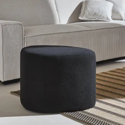 Hocker in Kieselsteinform mit Stoffbezug