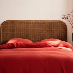 Kopfteil aus dunklem Rattan und Rattan-Geflecht