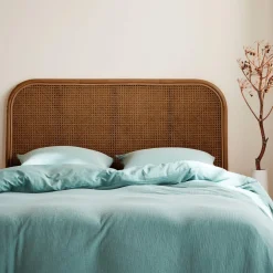 Kopfteil aus dunklem Rattan und Rattan-Geflecht