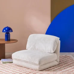 Sessel mit Schlaffunktion und breit geripptem Cordbezug