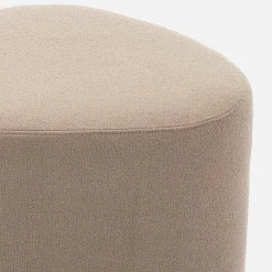 Hocker in Kieselsteinform mit Stoffbezug