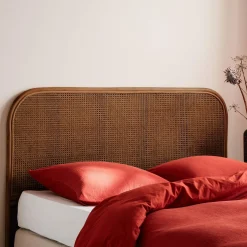 Kopfteil aus dunklem Rattan und Rattan-Geflecht