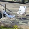 Set aus 2 Liegesesseln mit rundem Tisch aus Stahl