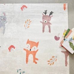 Weißer Kinderteppich mit Tiermotiven